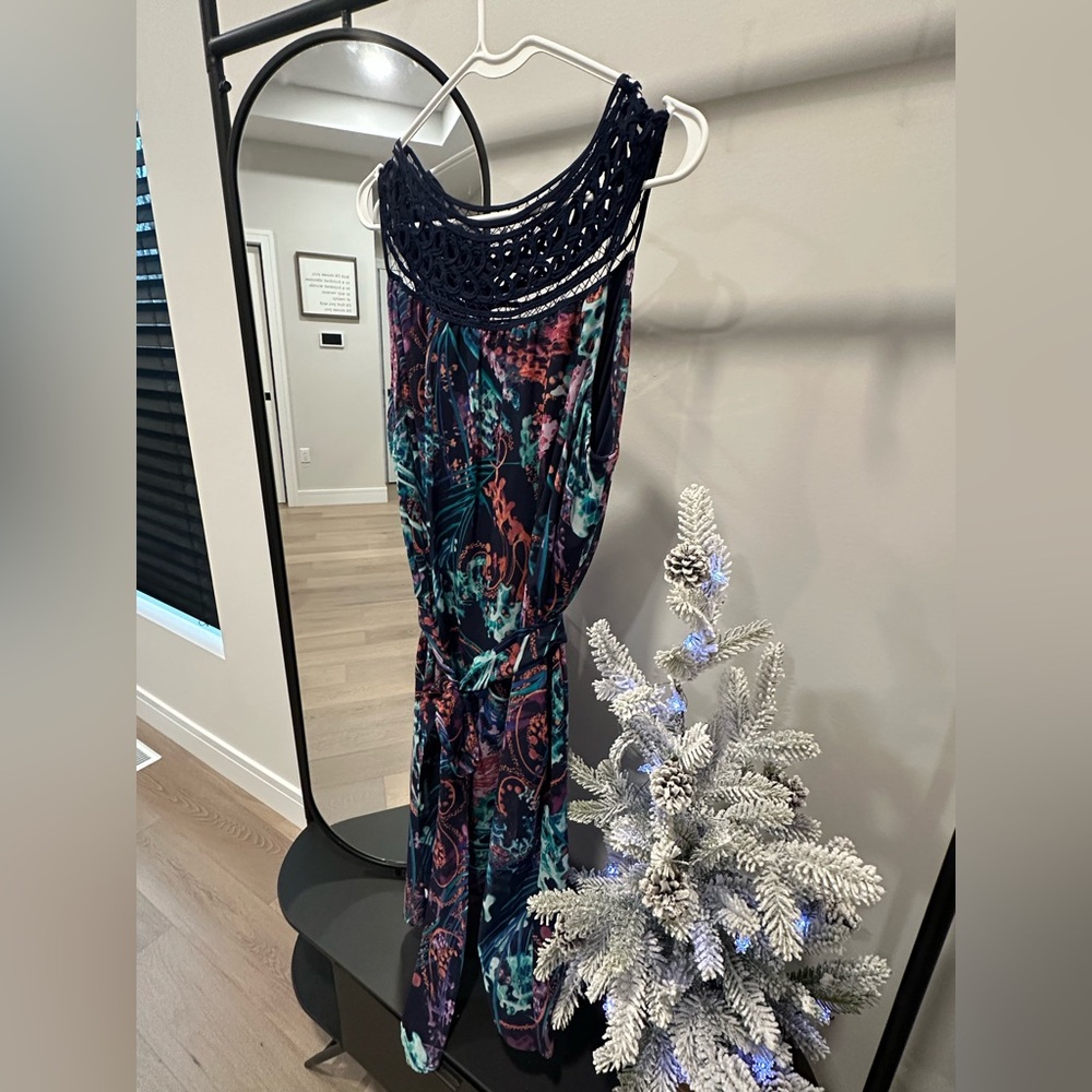 Blue dress with abstract designs. Only worn 3 or 4 times. Light material.